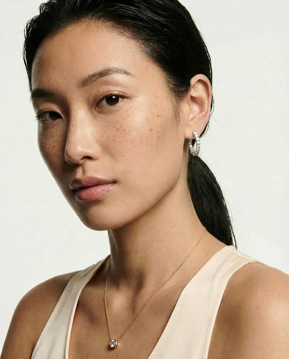 Small hoops with an oval diamond