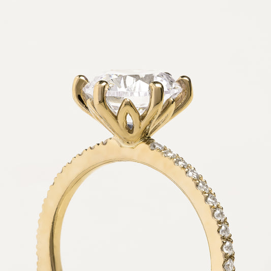 Brilliant Round Cut Ring with Pavé and Flower Prongs