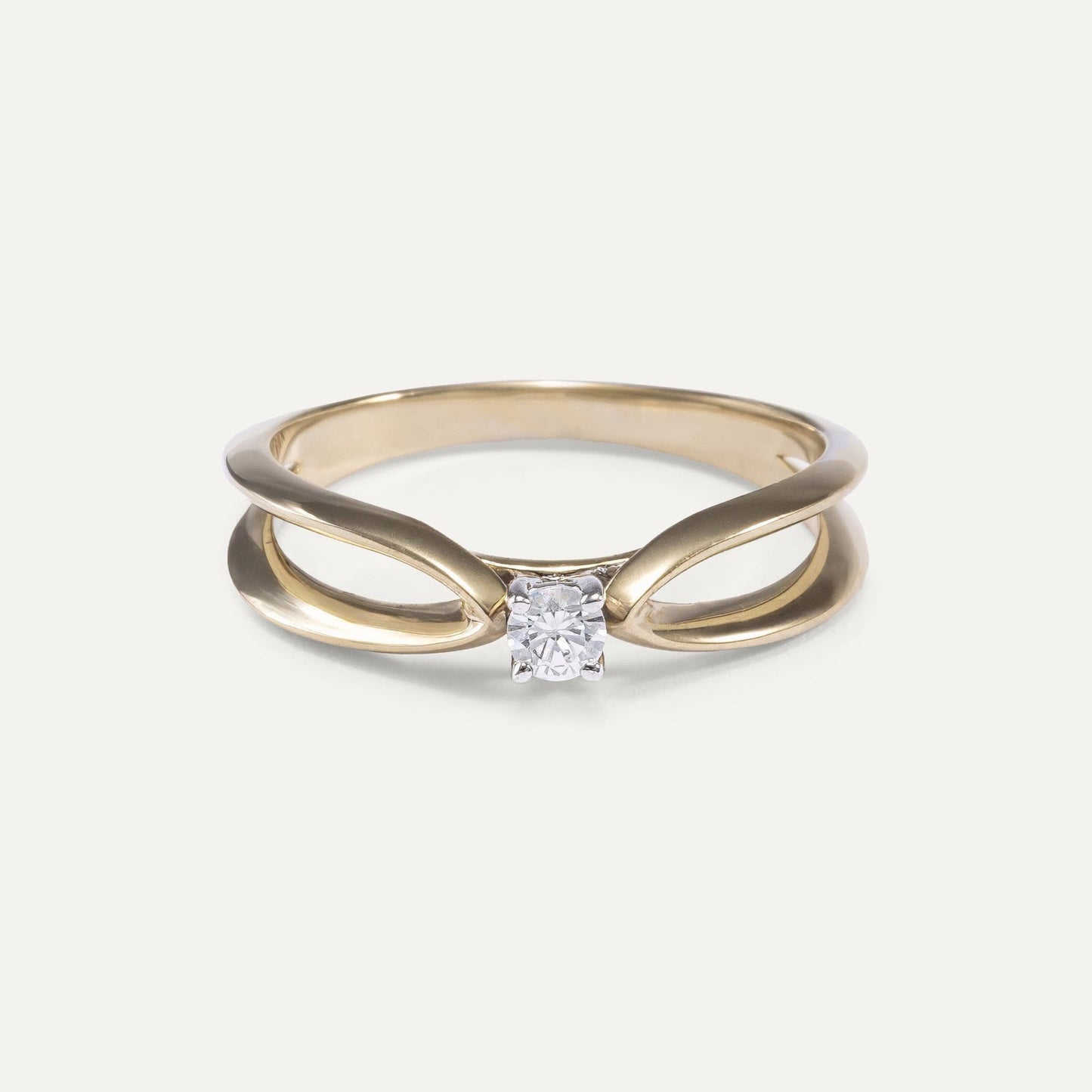 Round cut diamond engagement ring with loop design