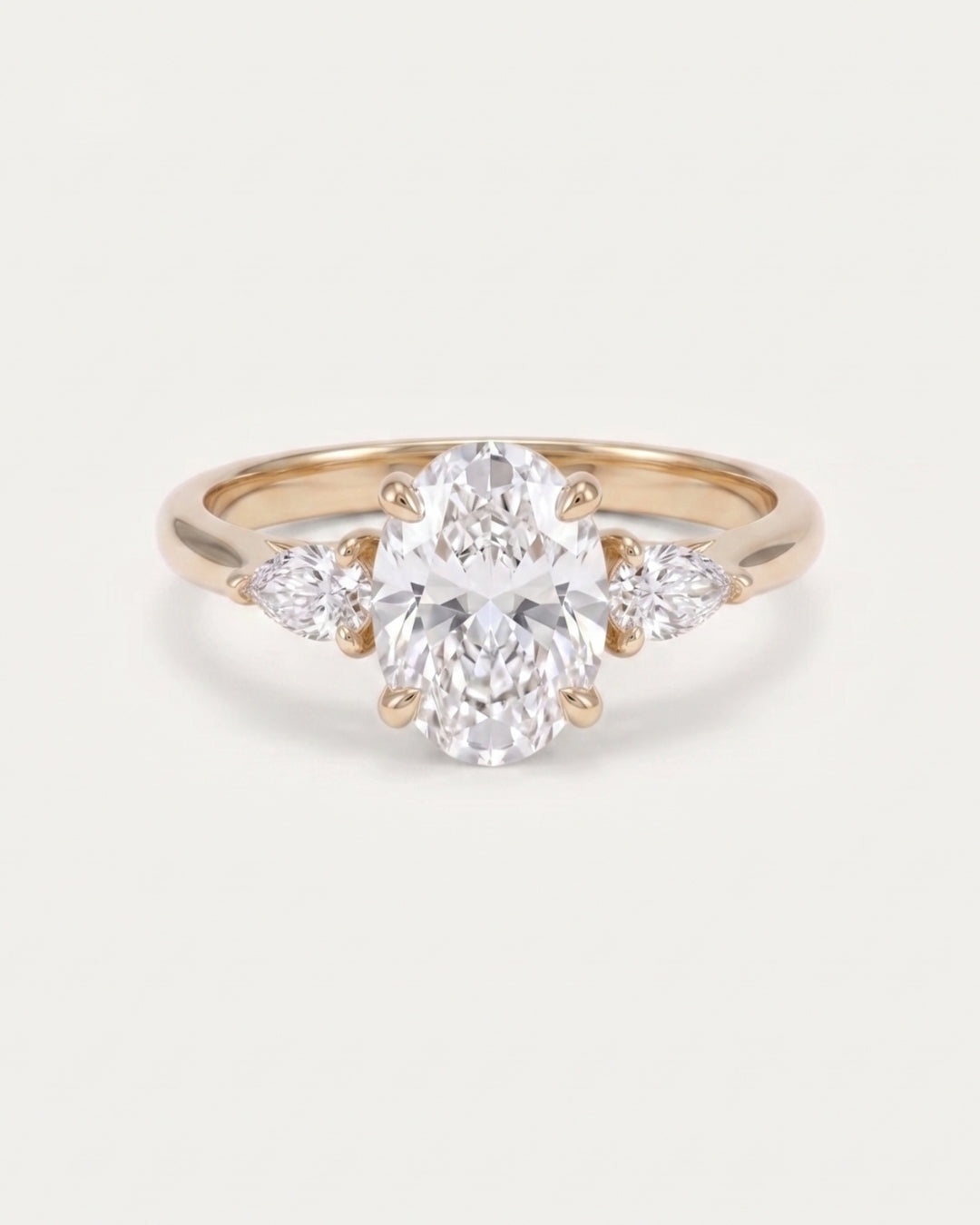 Oval & Pear Diamond Three Stone Engagement Ring
