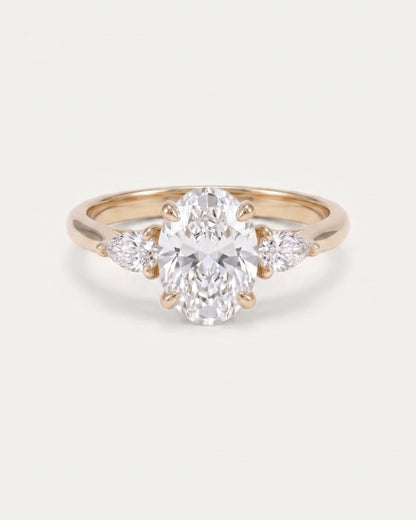Oval & Pear Diamond Three Stone Engagement Ring