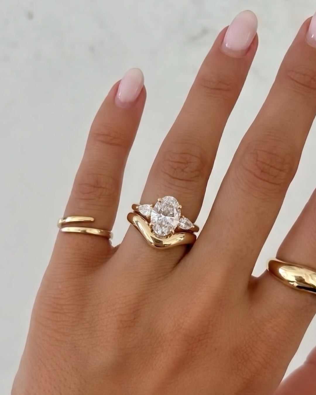 Oval & Pear Diamond Three Stone Engagement Ring