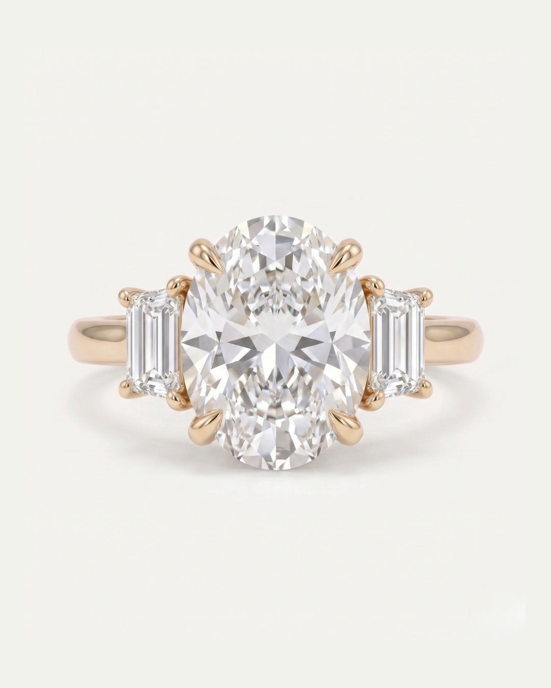 Oval & Trapezoid Diamond Three Stone Ring