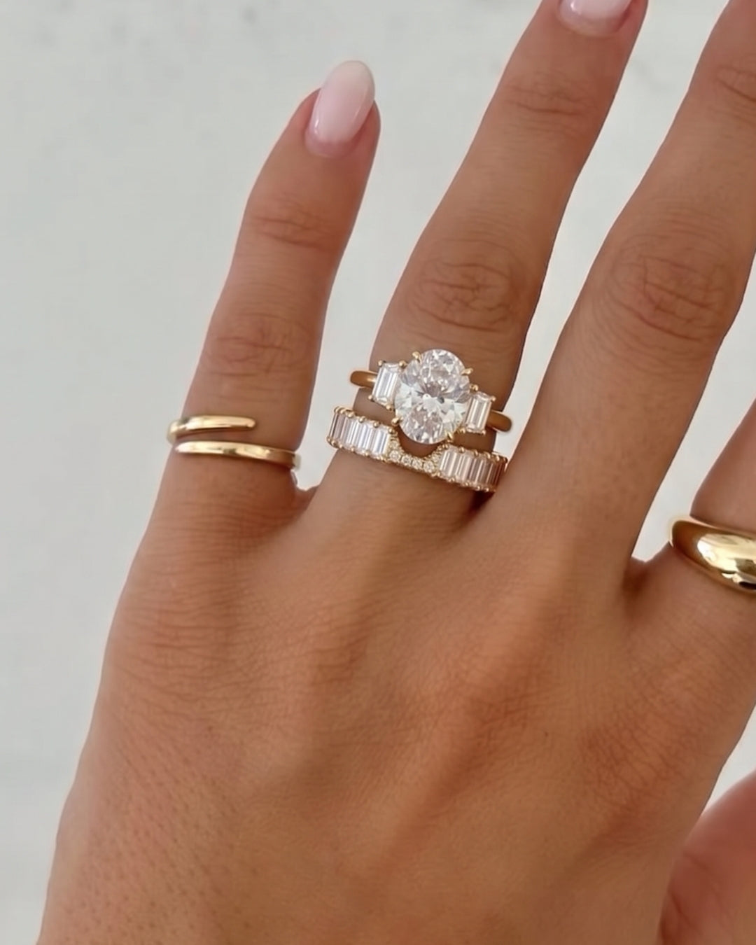 Oval & Trapezoid Diamond Three Stone Ring