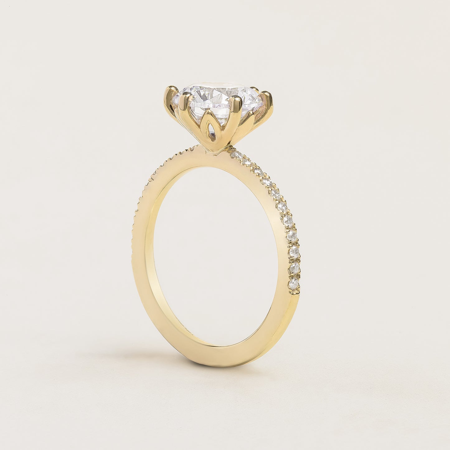 Brilliant Round Cut Ring with Pavé and Flower Prongs