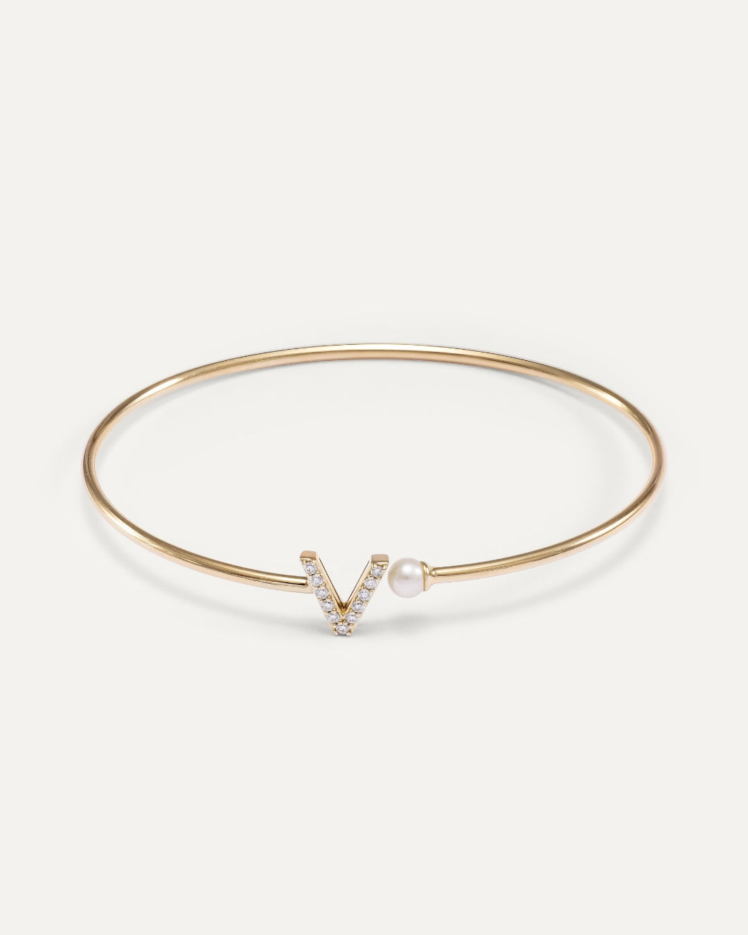 Bangle bracelet with initial and pearl