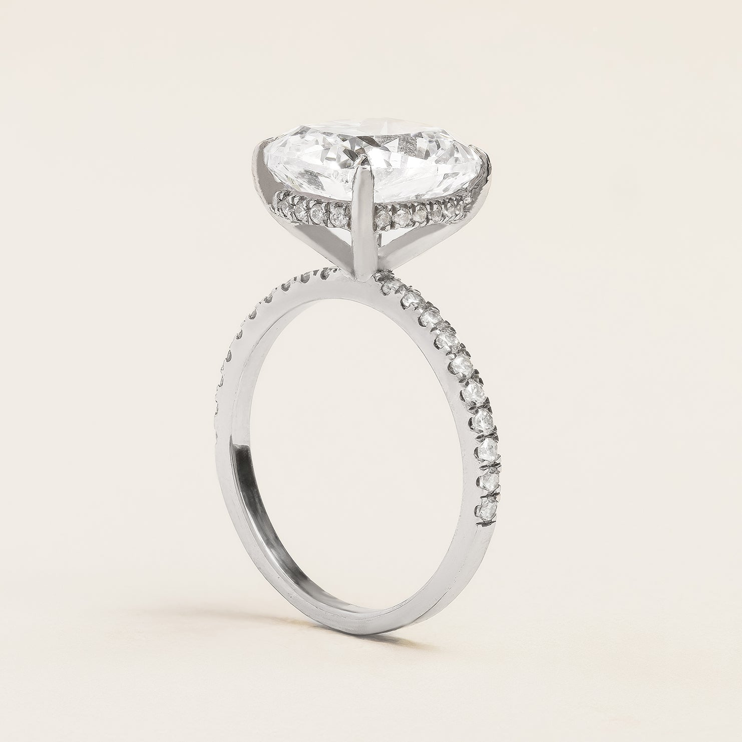 Elongated Cushion Cut Engagement Ring With Hidden Halo