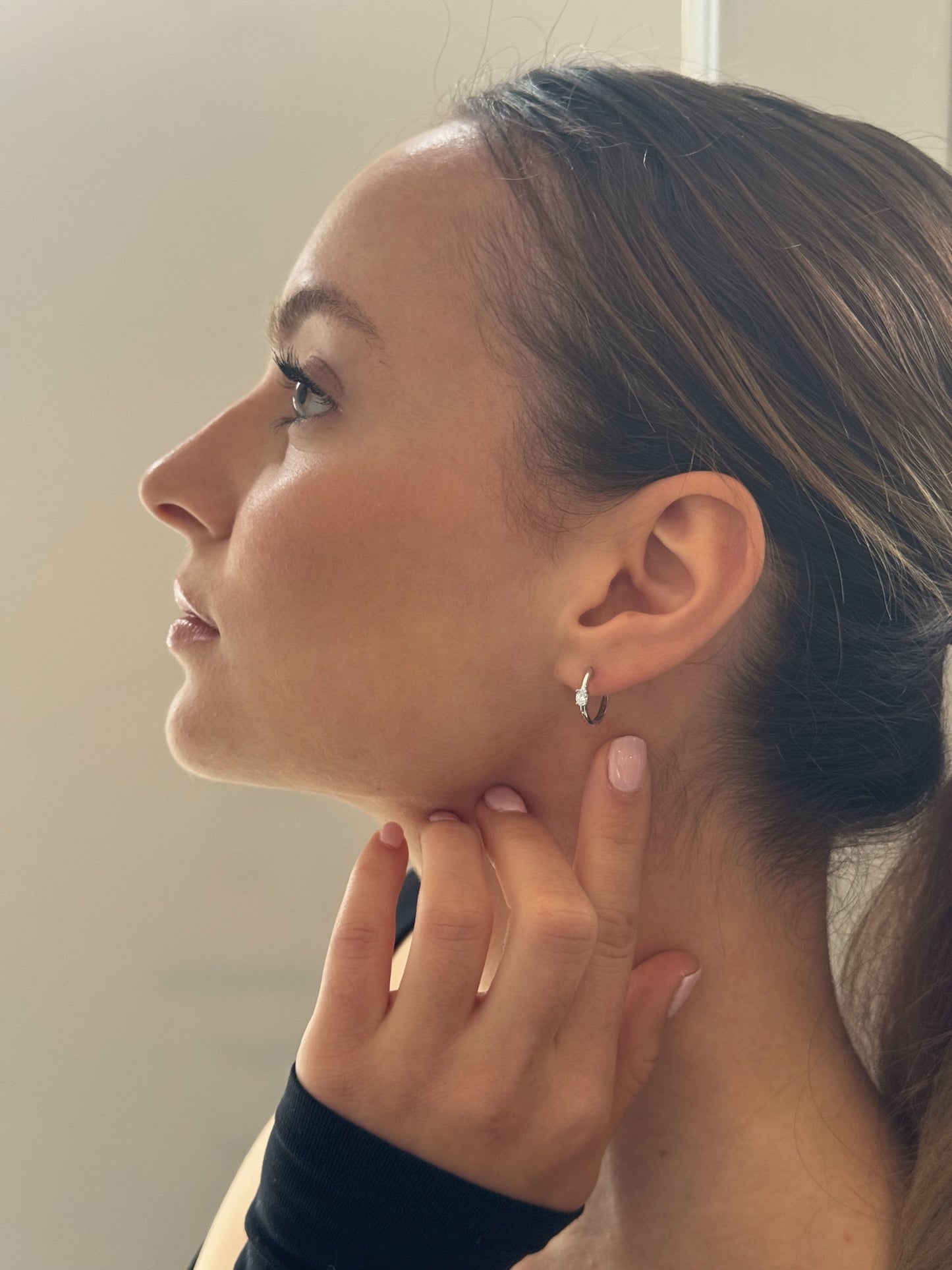 Small hoops with an oval diamond