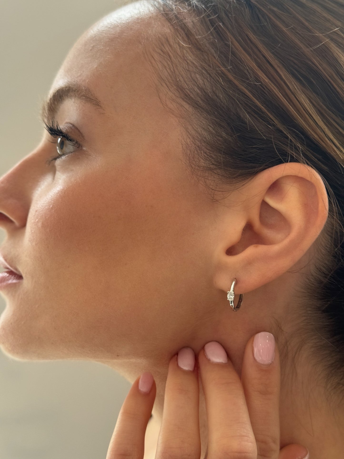 Small hoops with an oval diamond