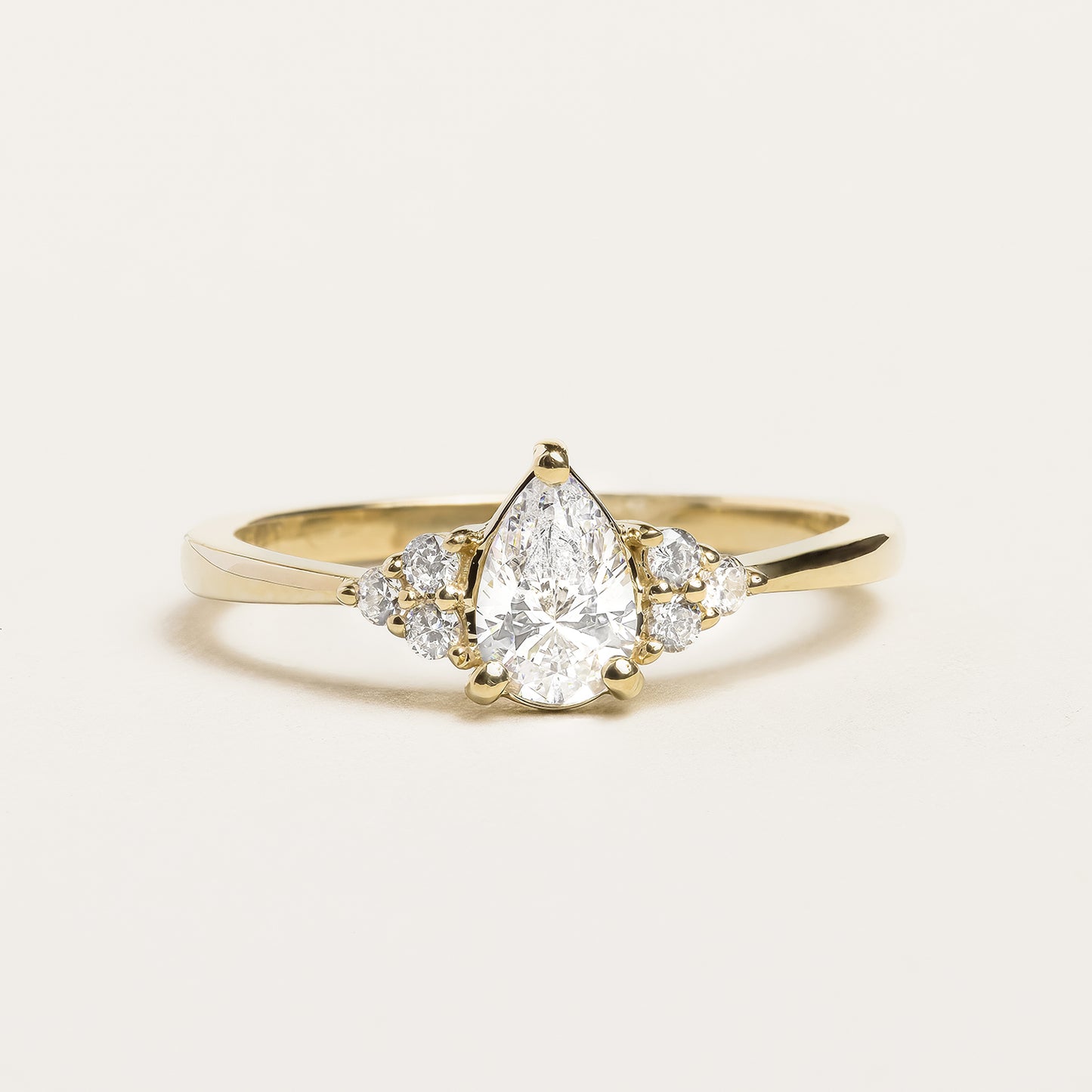 Pear Cut with Mini Cluster Engagement Ring