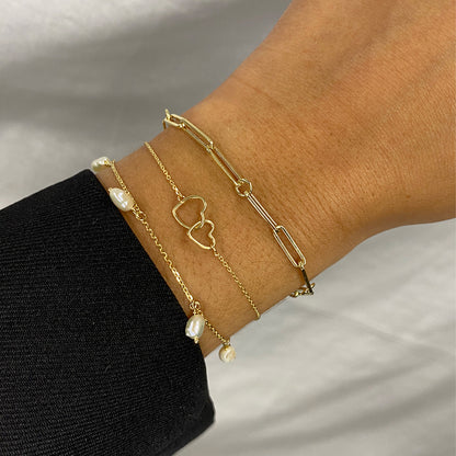 Jackie Amsterdam Double Heart Bracelet in 14K Yellow Gold worn on wrist