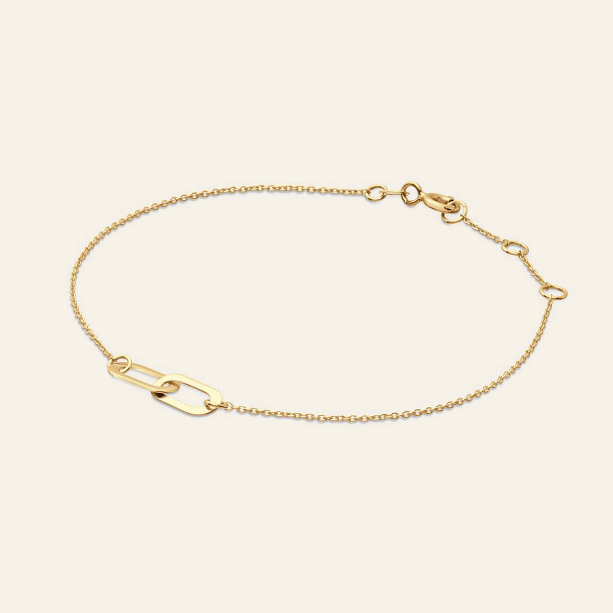 Jackie Amsterdam Cannaregio Bracelet in 14K Yellow Gold on light beige background