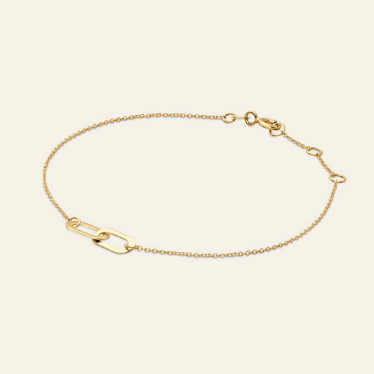 Jackie Amsterdam Cannaregio Bracelet in 14K Yellow Gold on light beige background