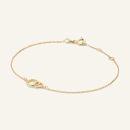 JKB25.408 Jackie Giro Doppio bracelet in 14K yellow gold on light beige background