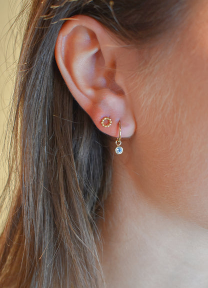 Jackie Amsterdam Blue Topaz Ear Charm in 14K Yellow Gold worn on model