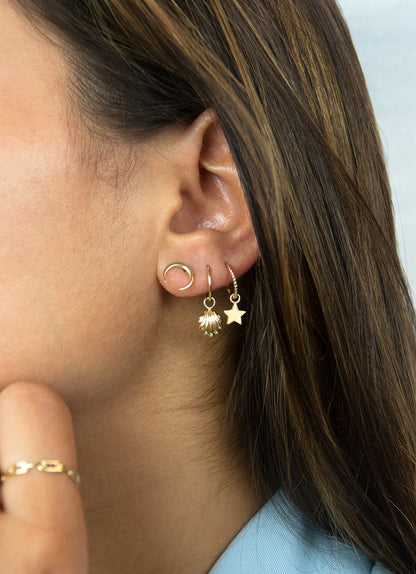 Jackie Amsterdam Star Ear Charm in 14K Yellow Gold worn on model