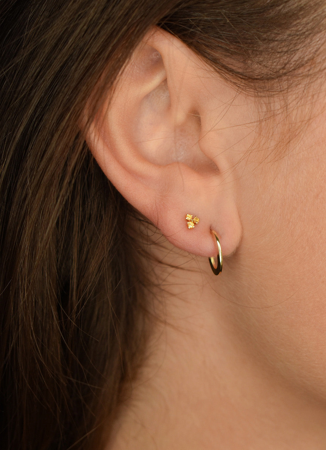 Triangle Citrine Studs in 14K Yellow Gold worn on ear
