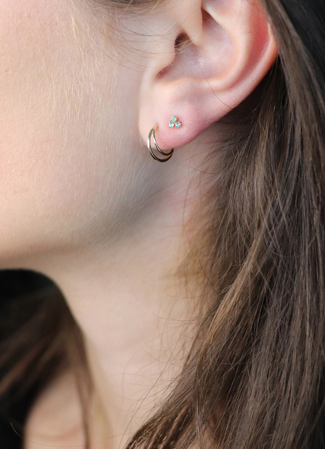 Triangle Topaz Studs in 14K Yellow Gold worn on ear