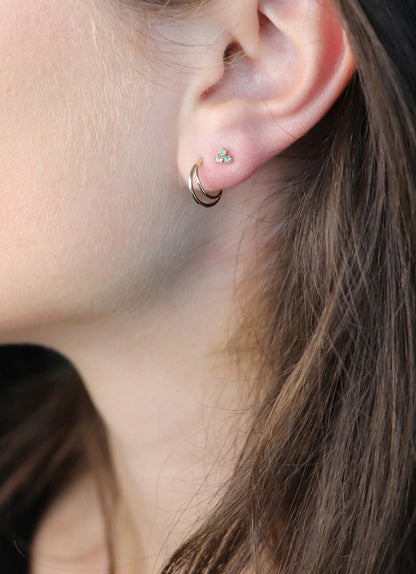 Triangle Topaz Studs in 14K Yellow Gold worn on ear