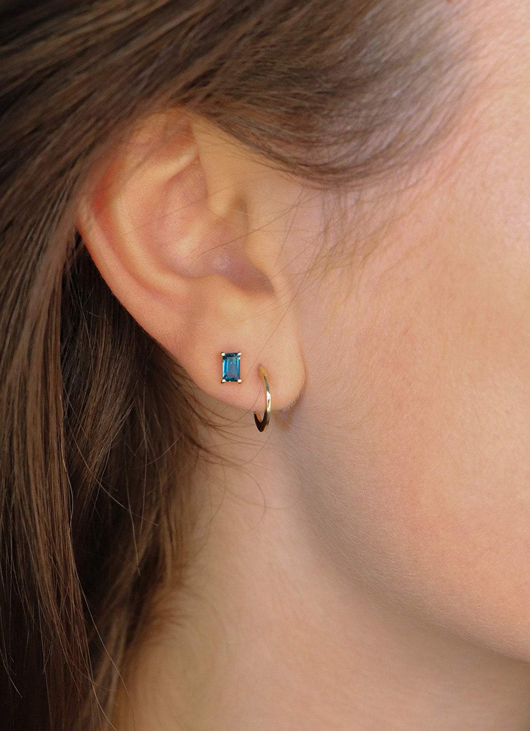 Jackie Classic Round Hoop Earrings 12mm in 14K Yellow Gold worn on ear