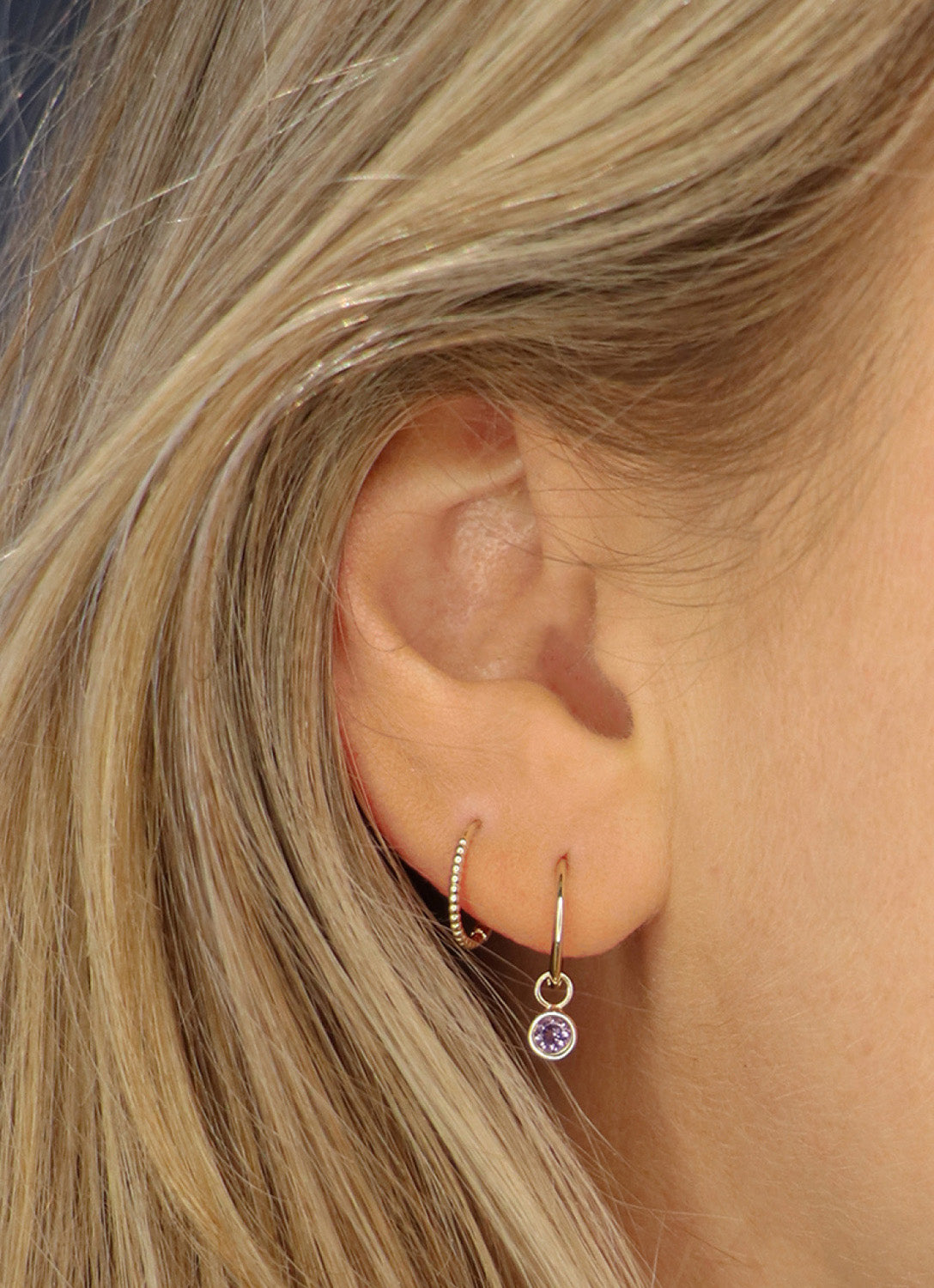 Jackie Mini Dots Hoops in 14K Yellow Gold worn on ear
