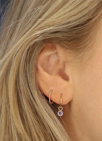 Jackie Mini Dots Hoops in 14K Yellow Gold worn on ear