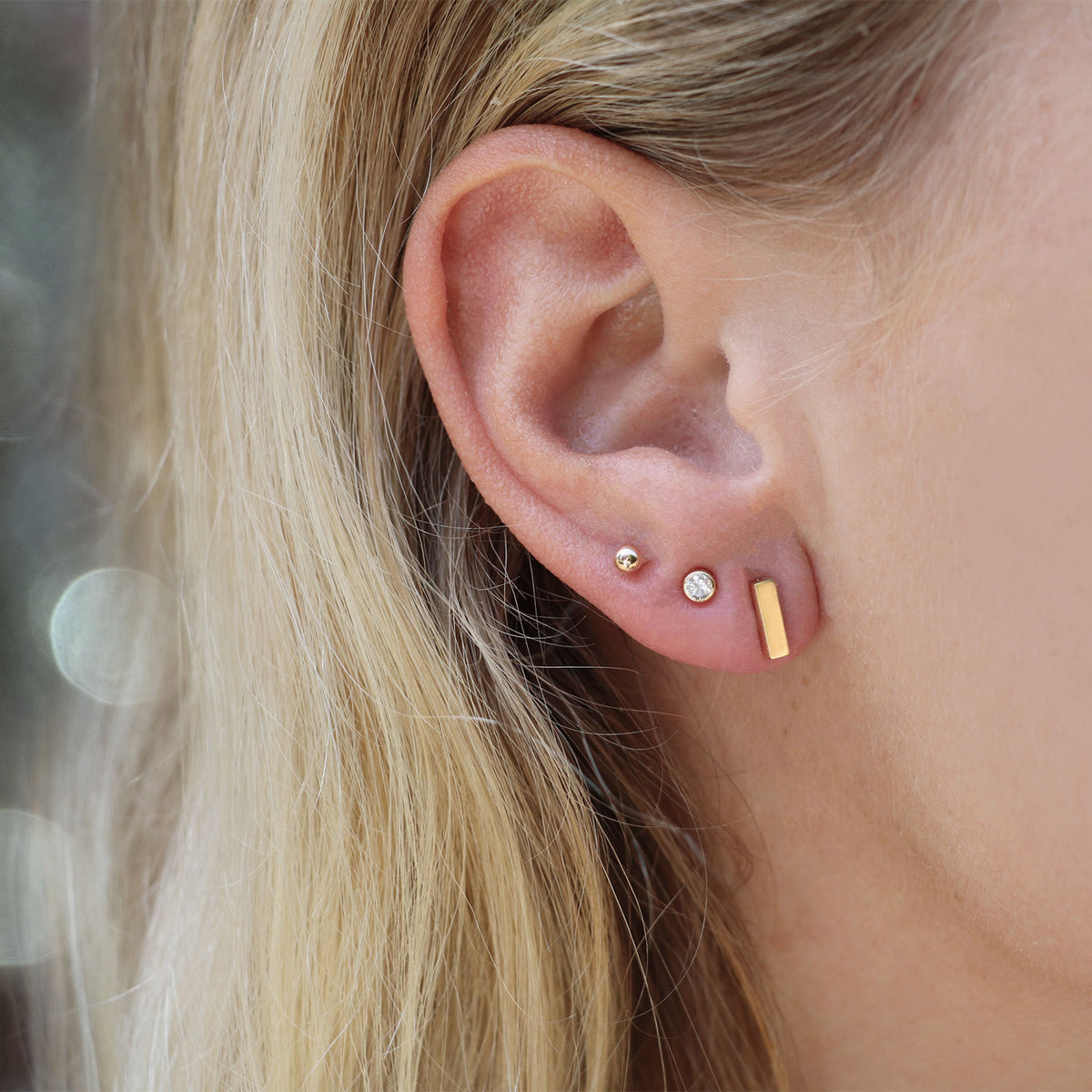 Jackie Ball Studs in 14K Yellow Gold worn on ear