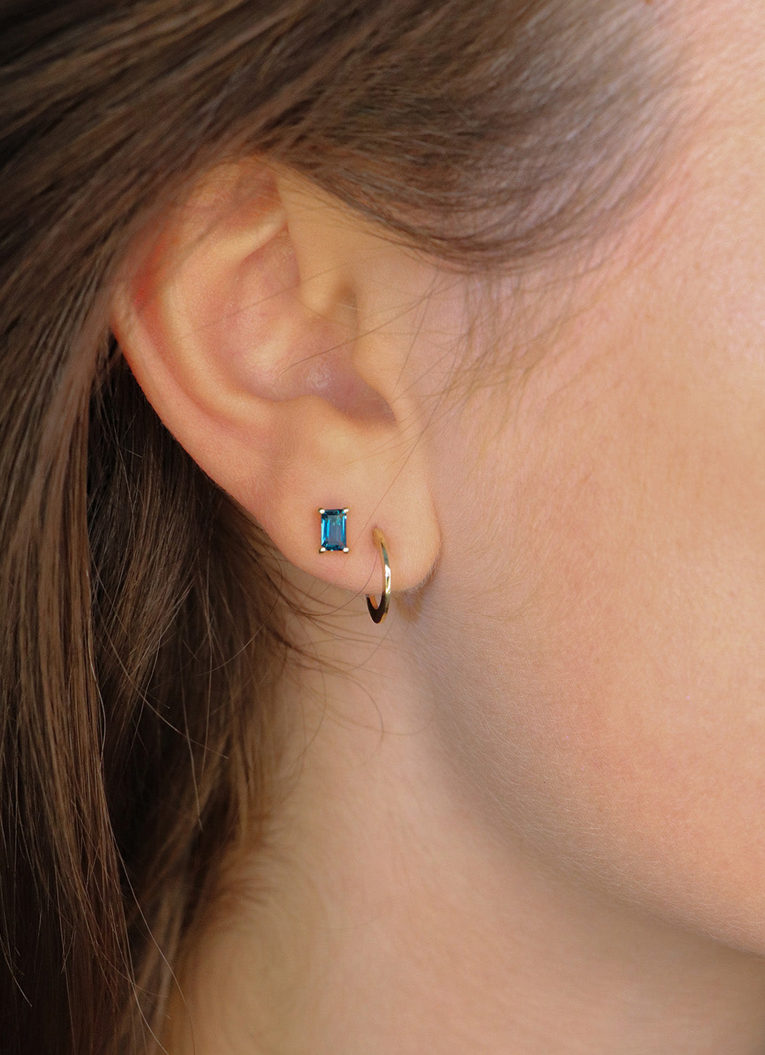 Jackie Medina Topaz Studs in 14K Yellow Gold worn on ear