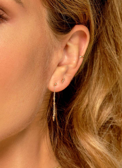 Jackie Bulles De Bruxelles Earrings in 14K Yellow Gold worn on ear
