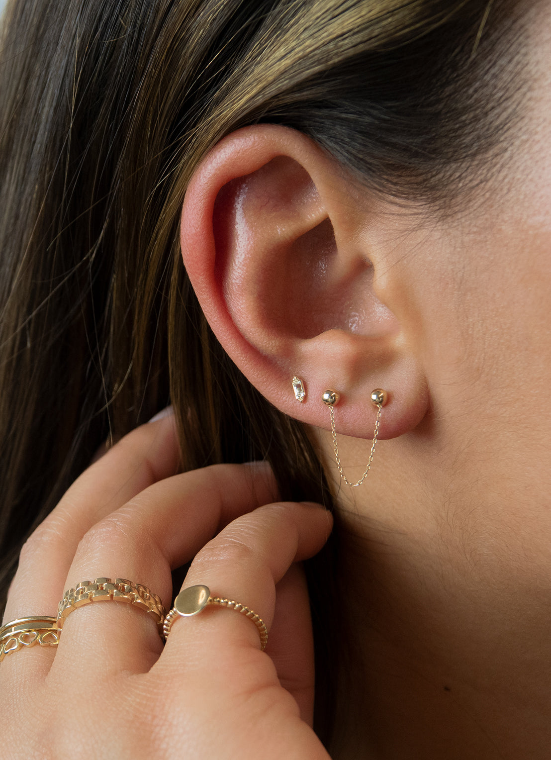 Jackie Gaudi Lantern Studs in 14K Yellow Gold worn on ear