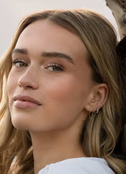 Jackie Gaudi Variado Topaz Studs in 14K Yellow Gold worn on ear