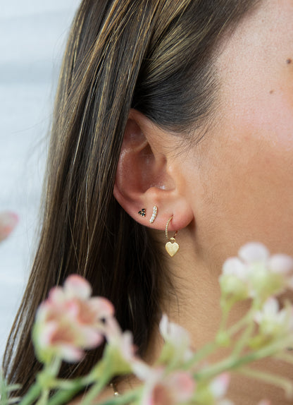 Jackie Corazon Hoops in 14K Yellow Gold worn on ear