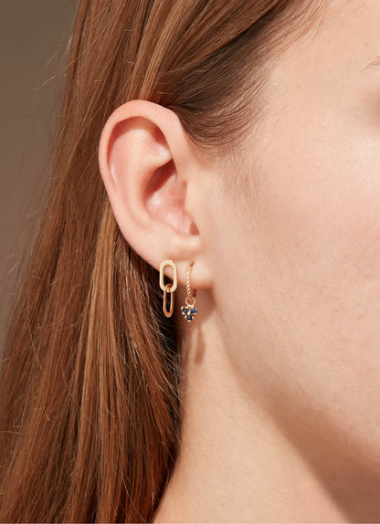 Jackie Triangle Sapphire Hoops in 14K Yellow Gold worn on ear