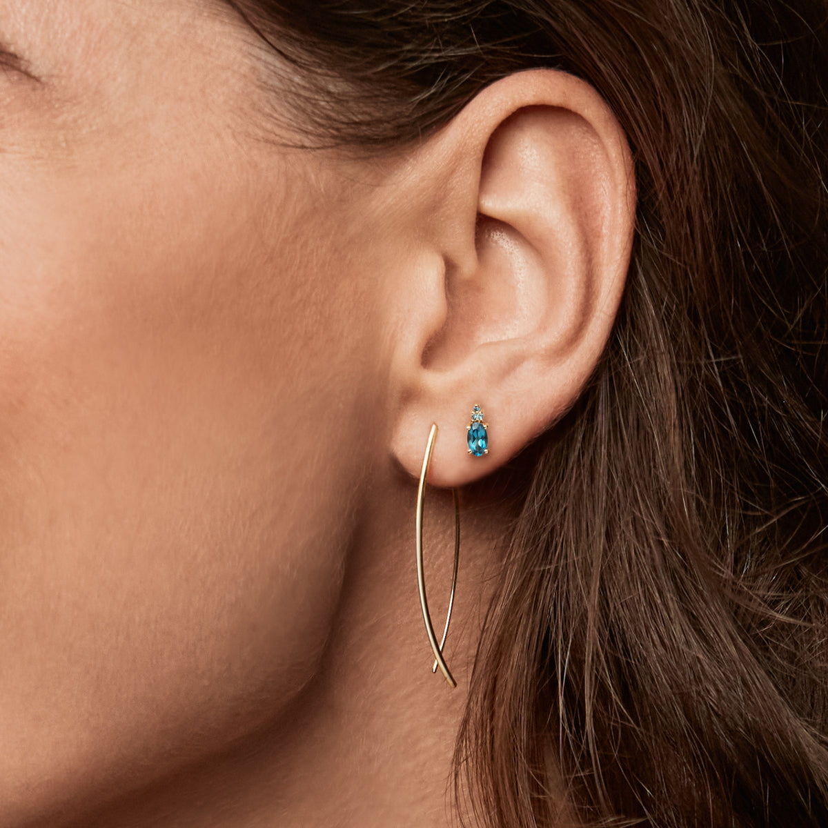 Jackie Vintage London Blue Topaz Studs in 14K Yellow Gold worn on ear