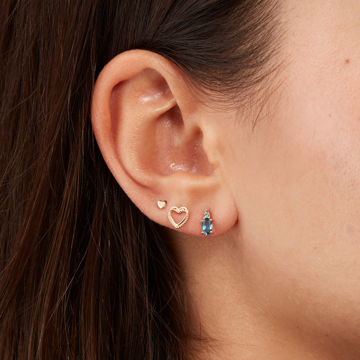 Jackie Vintage London Blue Topaz Studs in 14K Yellow Gold worn on ear