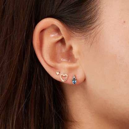 Jackie Vintage London Blue Topaz Studs in 14K Yellow Gold worn on ear