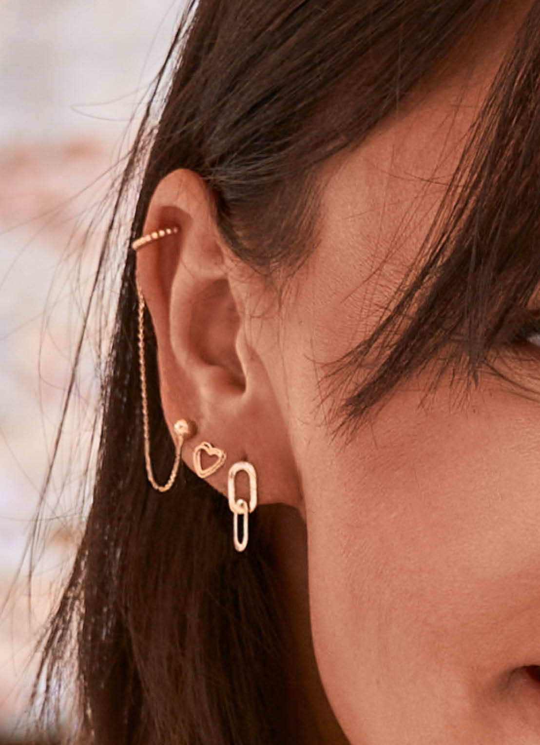 Jackie Cannaregio Studs in 14K Yellow Gold worn on ear