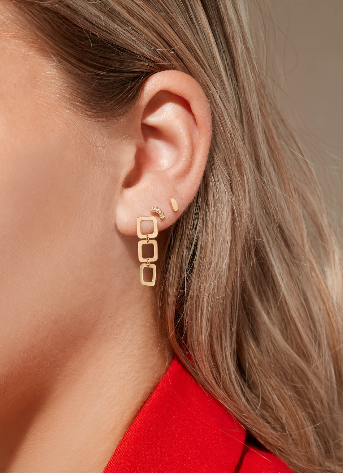 Jackie Laguna Studs in 14K Yellow Gold worn on ear