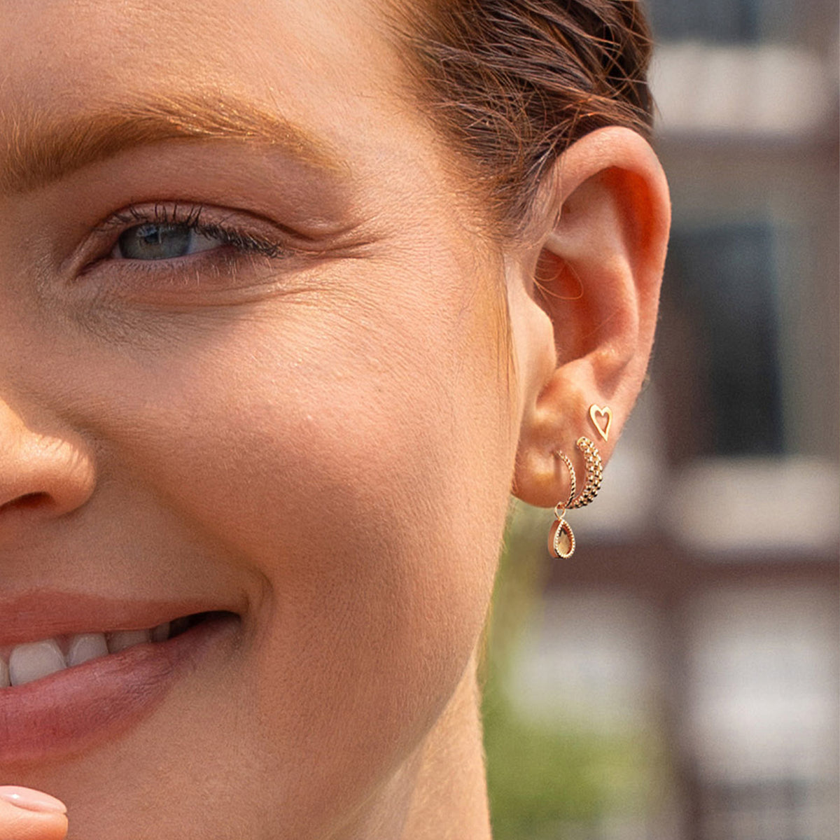 Jackie Amstel Citrine Hoops in 14K Yellow Gold worn on ear