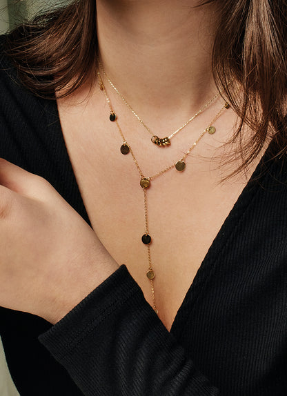Jackie Amsterdam Dazzle Y-Necklace worn layered on model