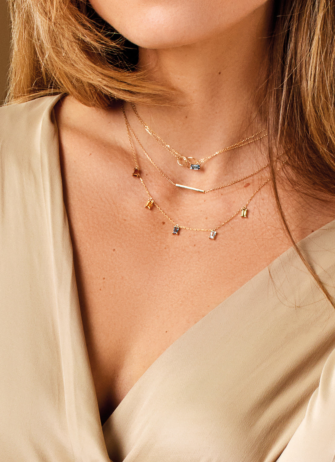 Jackie Amsterdam Bar necklace worn layered on model
