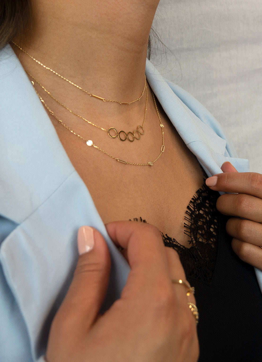 Jackie Amsterdam Beaux Arts necklace worn layered on model