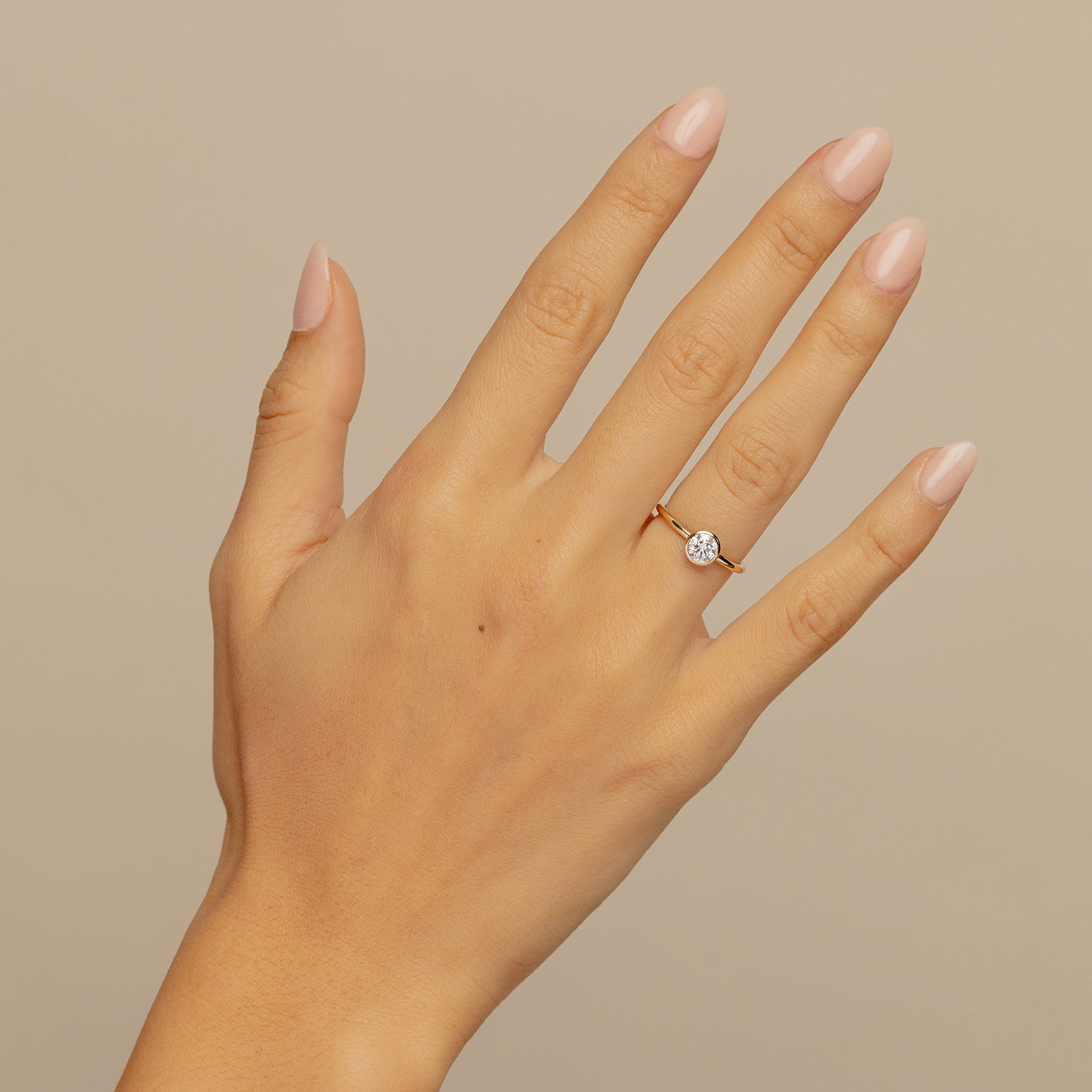large round bezel engagement ring