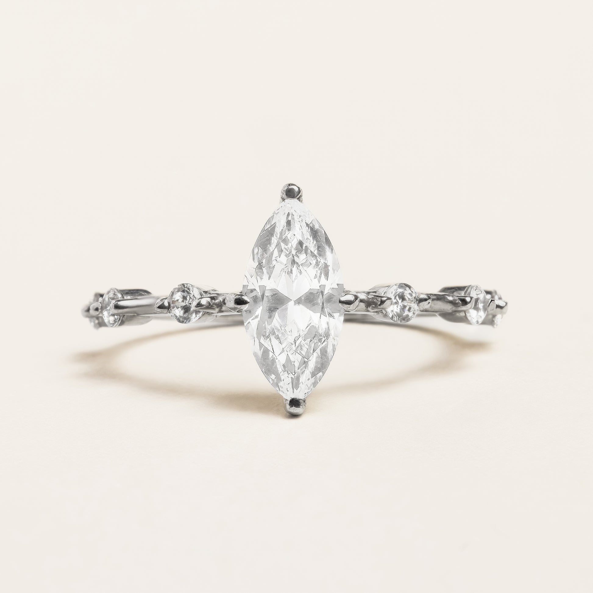 Marquise Diamond Engagement Ring With Accented Band