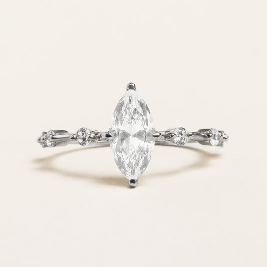 Marquise Diamond Engagement Ring With Accented Band