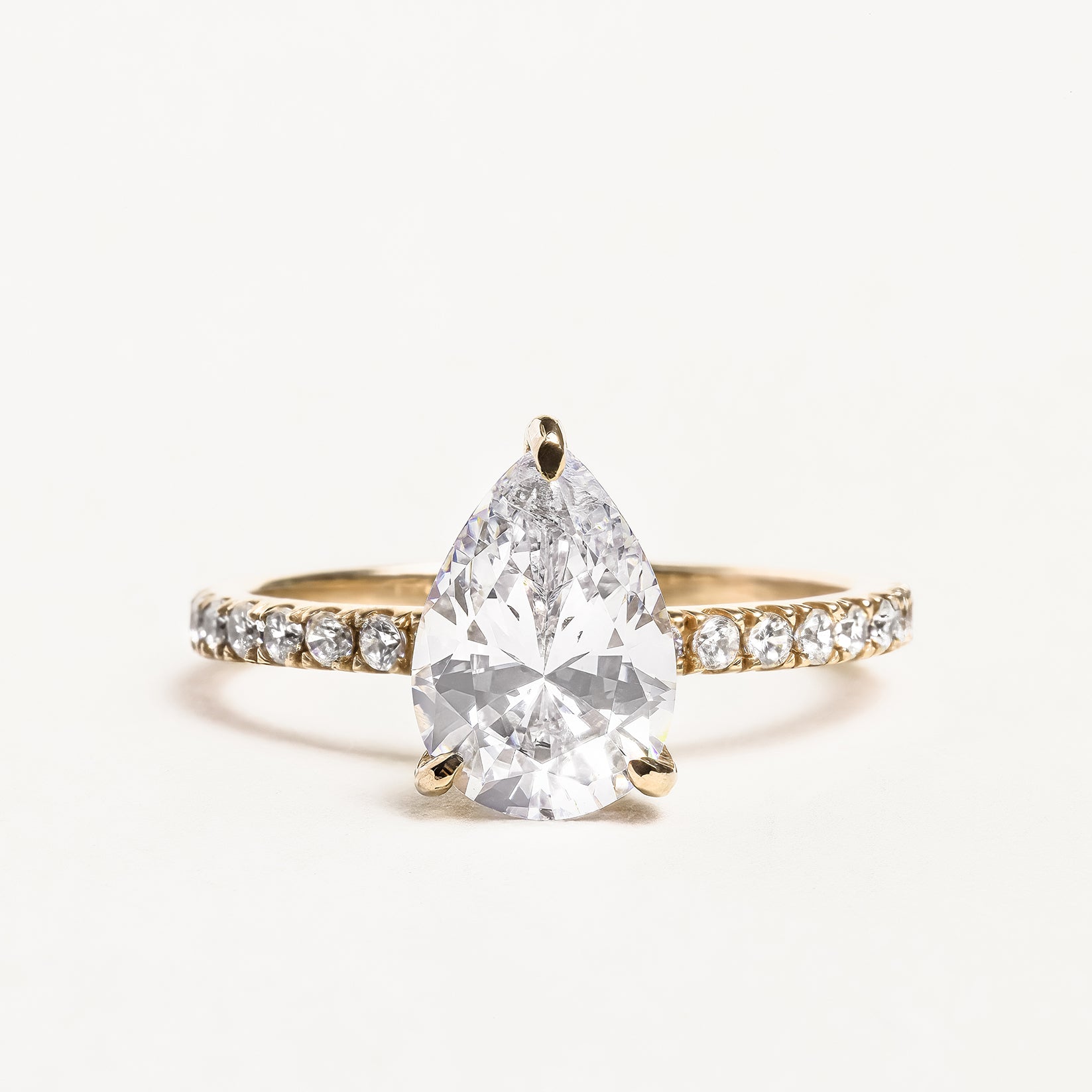 pavé pear shaped engagement ring