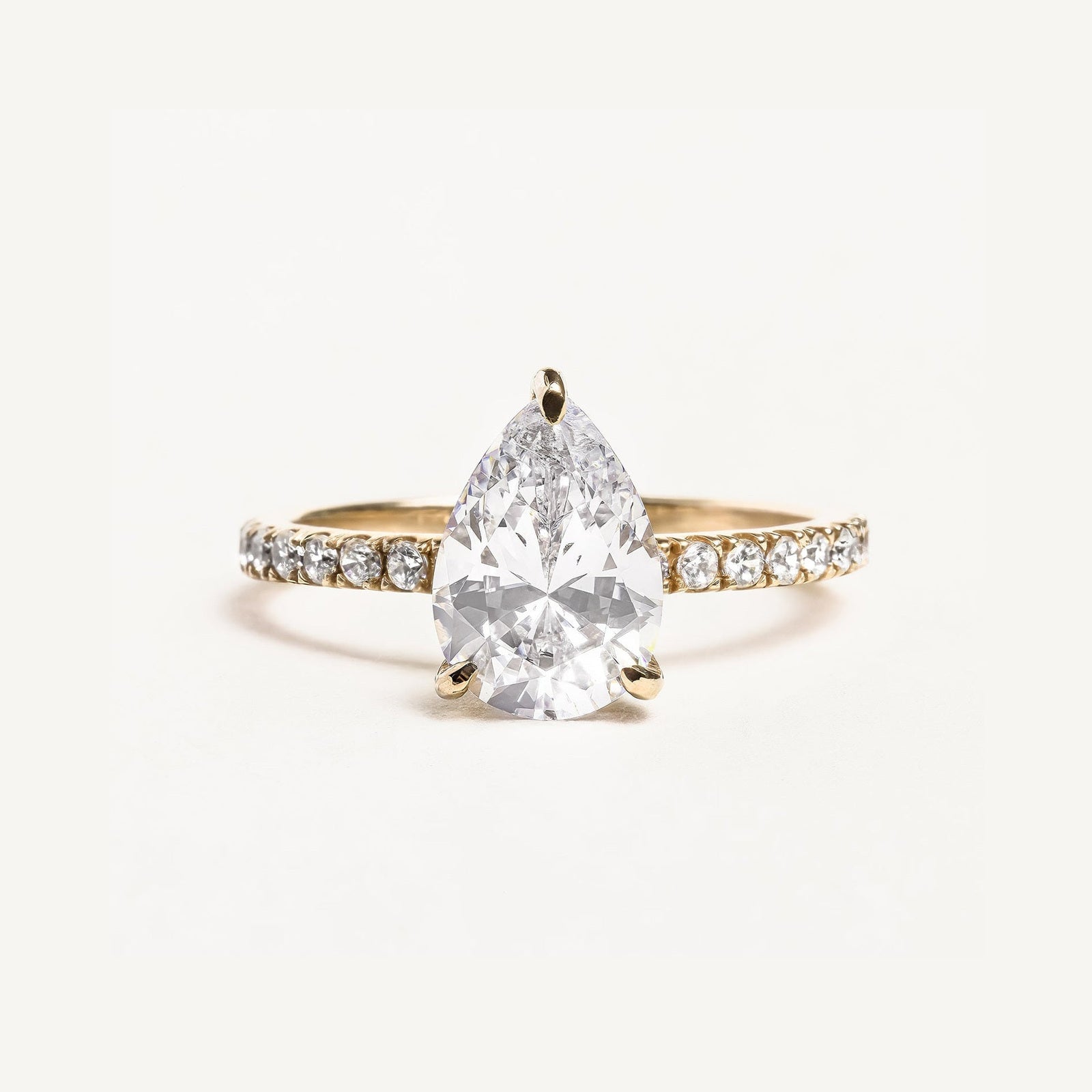 pavé pear shaped engagement ring