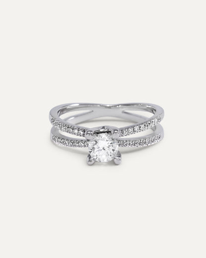 Round cut diamond engagement ring with split pavé bands