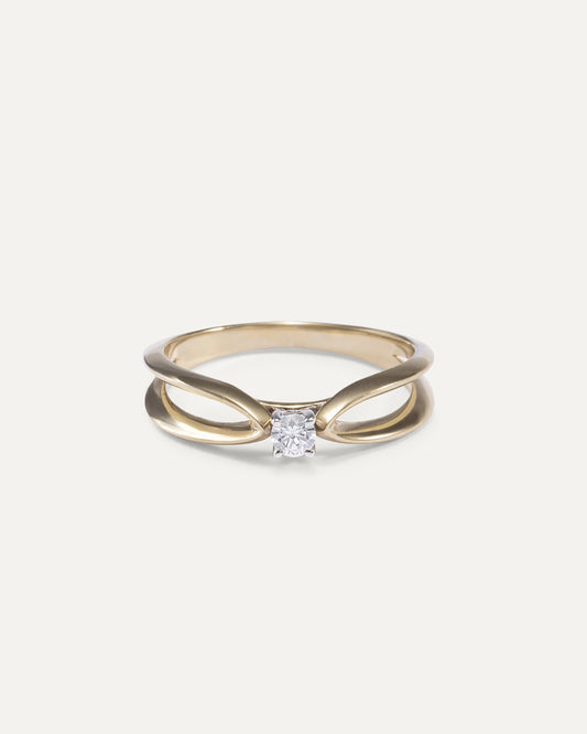 Round cut diamond engagement ring with loop design