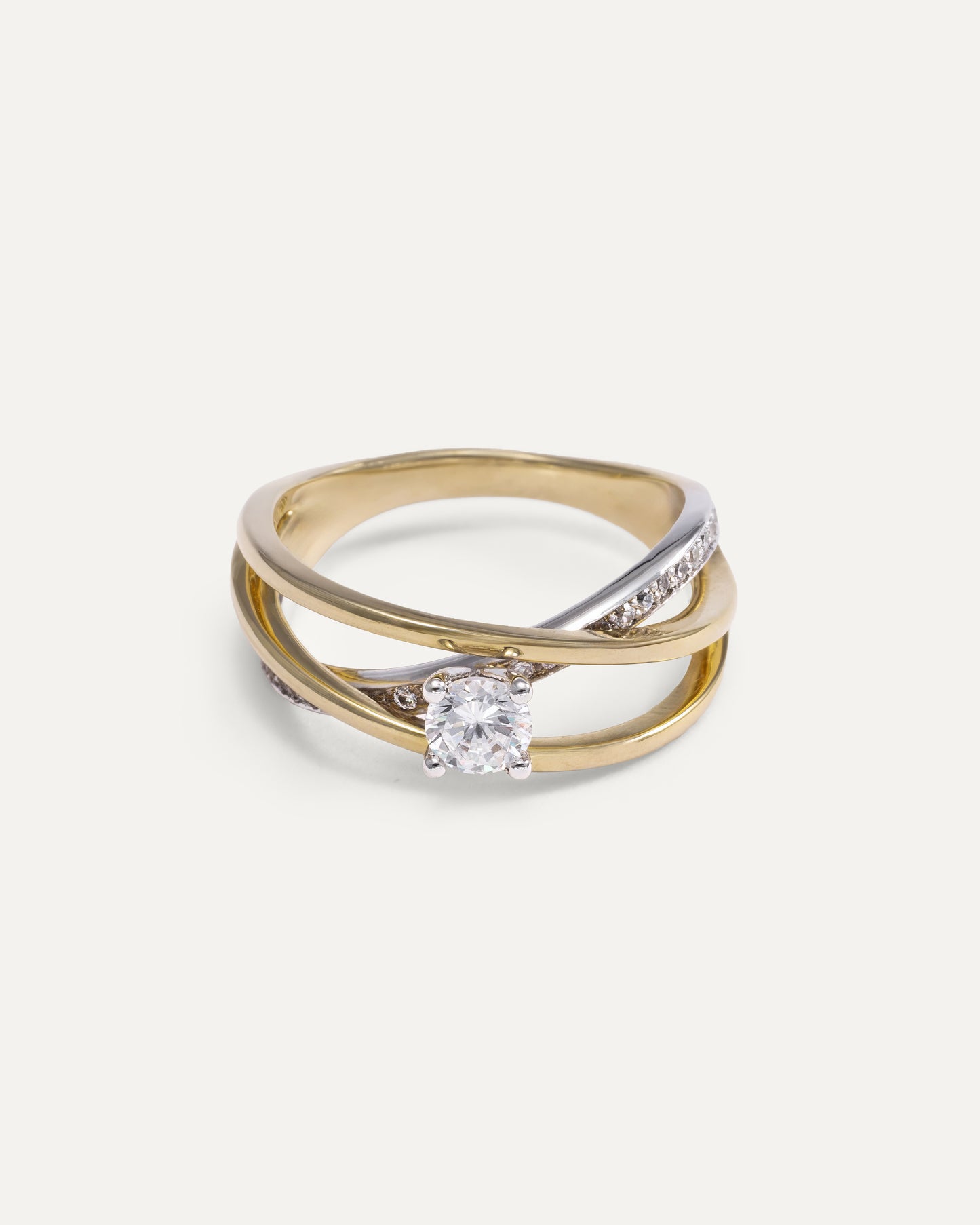 Intertwined engagement ring with diamonds